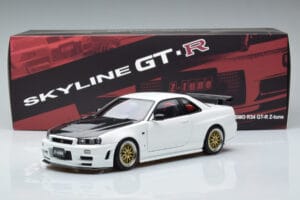 Nissan Skyline GT-R R34 Nismo Z-Tune Бял MotorHelix 1:18 M83407 Метал — снимка 11 от 11