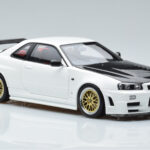 Nissan Skyline GT-R R34 Nismo Z-Tune Бял MotorHelix 1:18 - image 6 of 11
