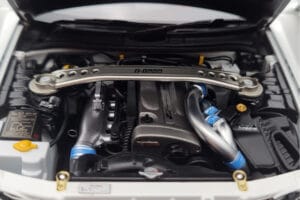 Nissan Skyline GT-R R34 Nismo Z-Tune Бял MotorHelix 1:18 M83407 Метал — снимка 9 от 11