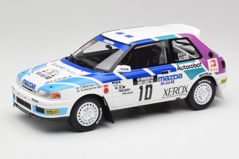 Mazda 323 GTX #10 T. Makinen / S. Harjanne 1000 Lakes Rally 1991 Otto 1:18 OT1099 Смола