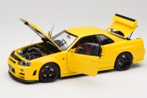 Nissan Skyline GT-R R34 Customized Version Жълт MotorHelix 1:18 M83412 Метал — снимка 2 от 8
