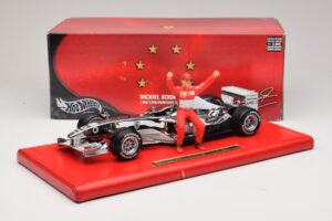 Ferrari F2004 #1 M. Schumacher Six Time World Champion 2004 Хром Сребърен Hot Wheels 1:18 C7332 Метал — снимка 6 от 6