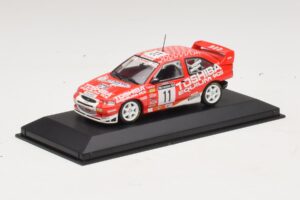 Ford Escort Cosworth Toshiba #11 A. Vatanen / Freeman 1994 Minichamps 1:43 430981811 Метал — снимка 2 от 4